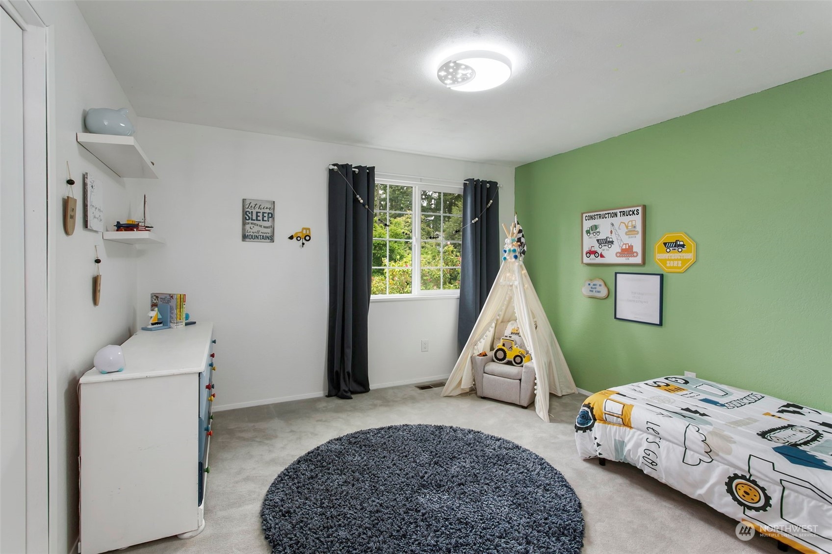 205 155th Place Southeast Bothell, WA 98012 - Photo 12 of 37 a room with toys and a window