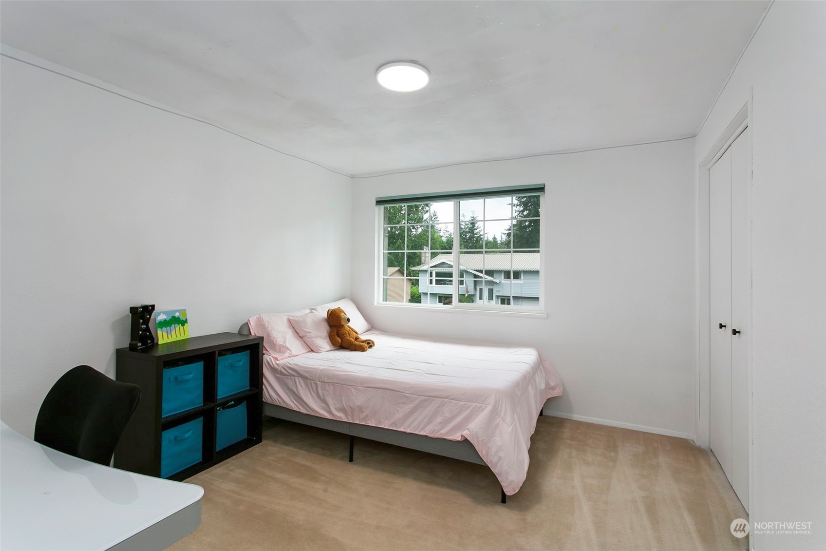 205 155th Place Southeast Bothell, WA 98012 - Photo 13 of 37 a bedroom with a bed and a window