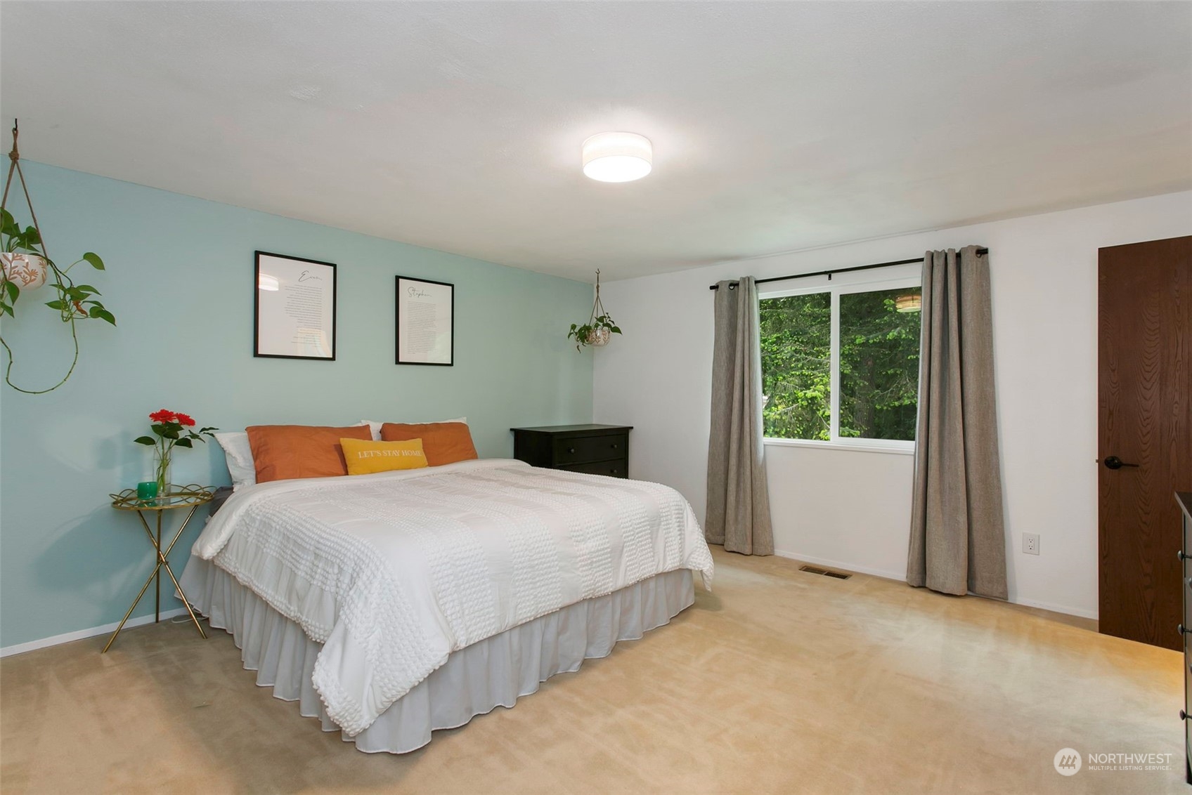 205 155th Place Southeast Bothell, WA 98012 - Photo 14 of 37 a bedroom with a bed and a window