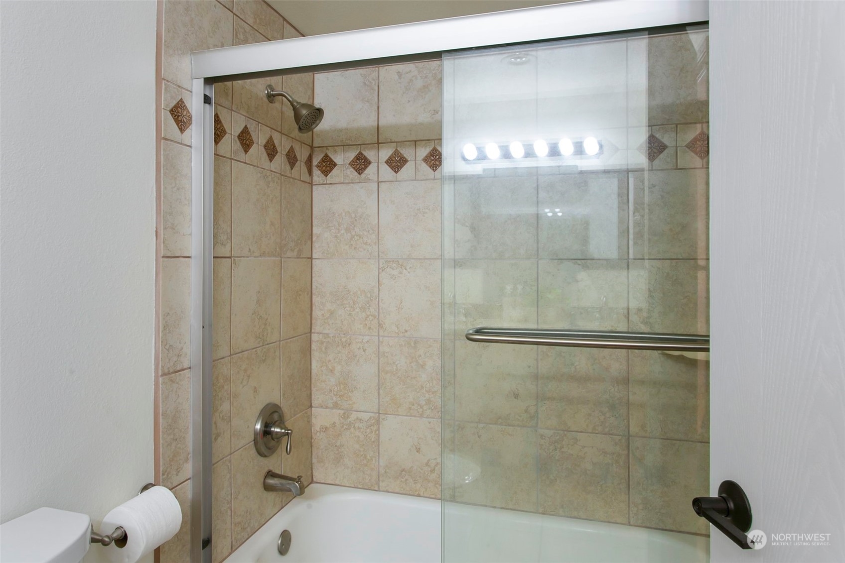 205 155th Place Southeast Bothell, WA 98012 - Photo 18 of 37 a bathroom with a shower and a toilet