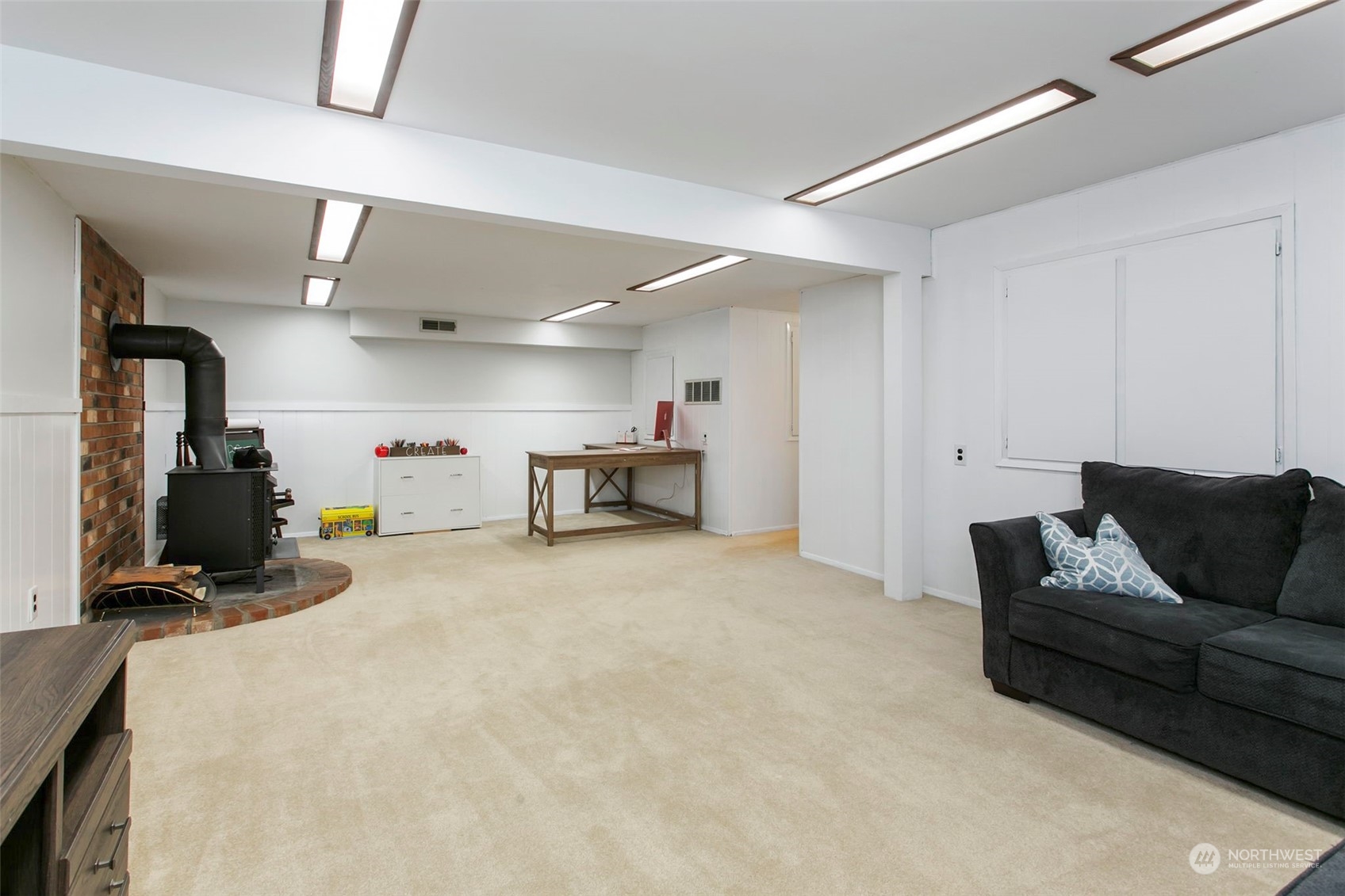 205 155th Place Southeast Bothell, WA 98012 - Photo 23 of 37 a living room with furniture and a couch