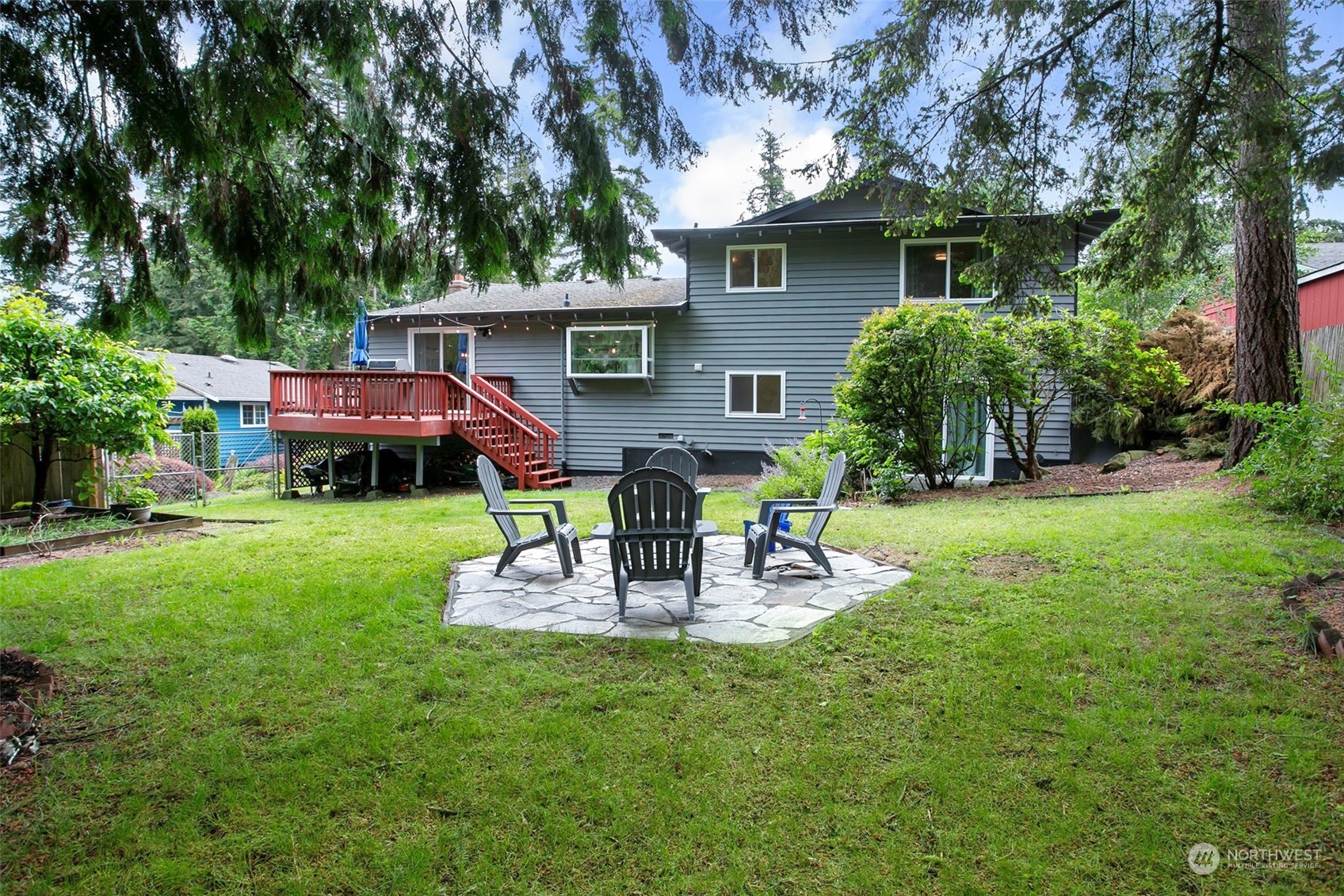 205 155th Place Southeast Bothell, WA 98012 - Photo 26 of 37 a view of a house with a yard and sitting area
