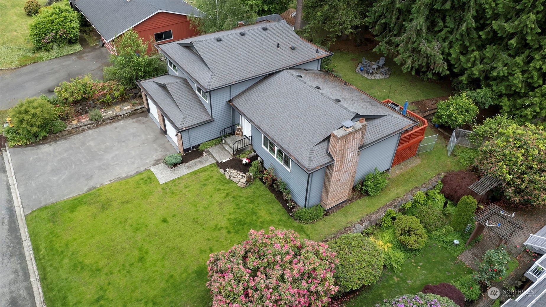 205 155th Place Southeast Bothell, WA 98012 - Photo 36 of 37 an aerial view of a house with garden space and street view