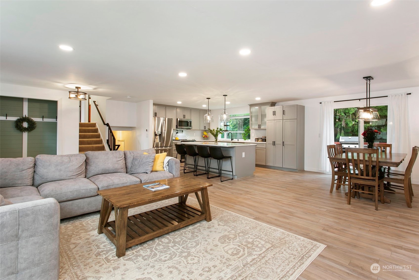 205 155th Place Southeast Bothell, WA 98012 - Photo 6 of 37 a living room with furniture and kitchen view