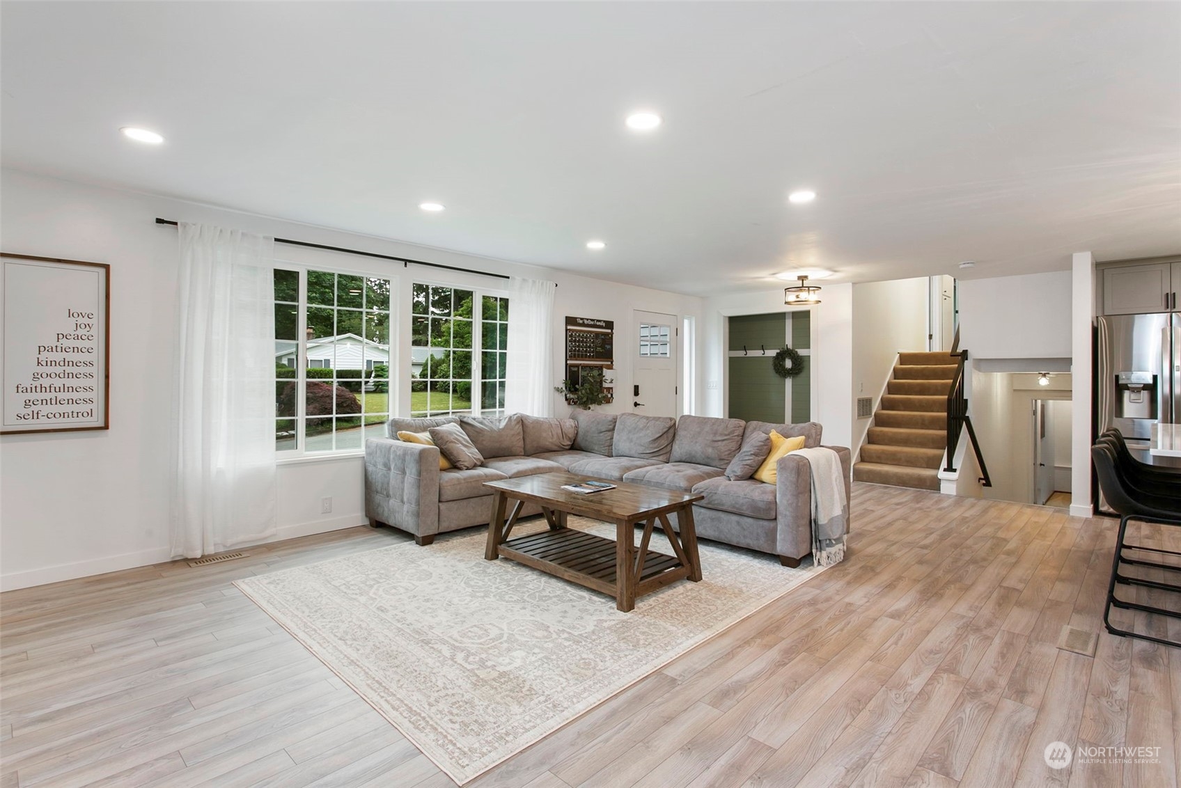 205 155th Place Southeast Bothell, WA 98012 - Photo 7 of 37 a living room with furniture and a window
