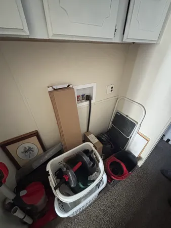 a bathroom with a toilet and a mirror