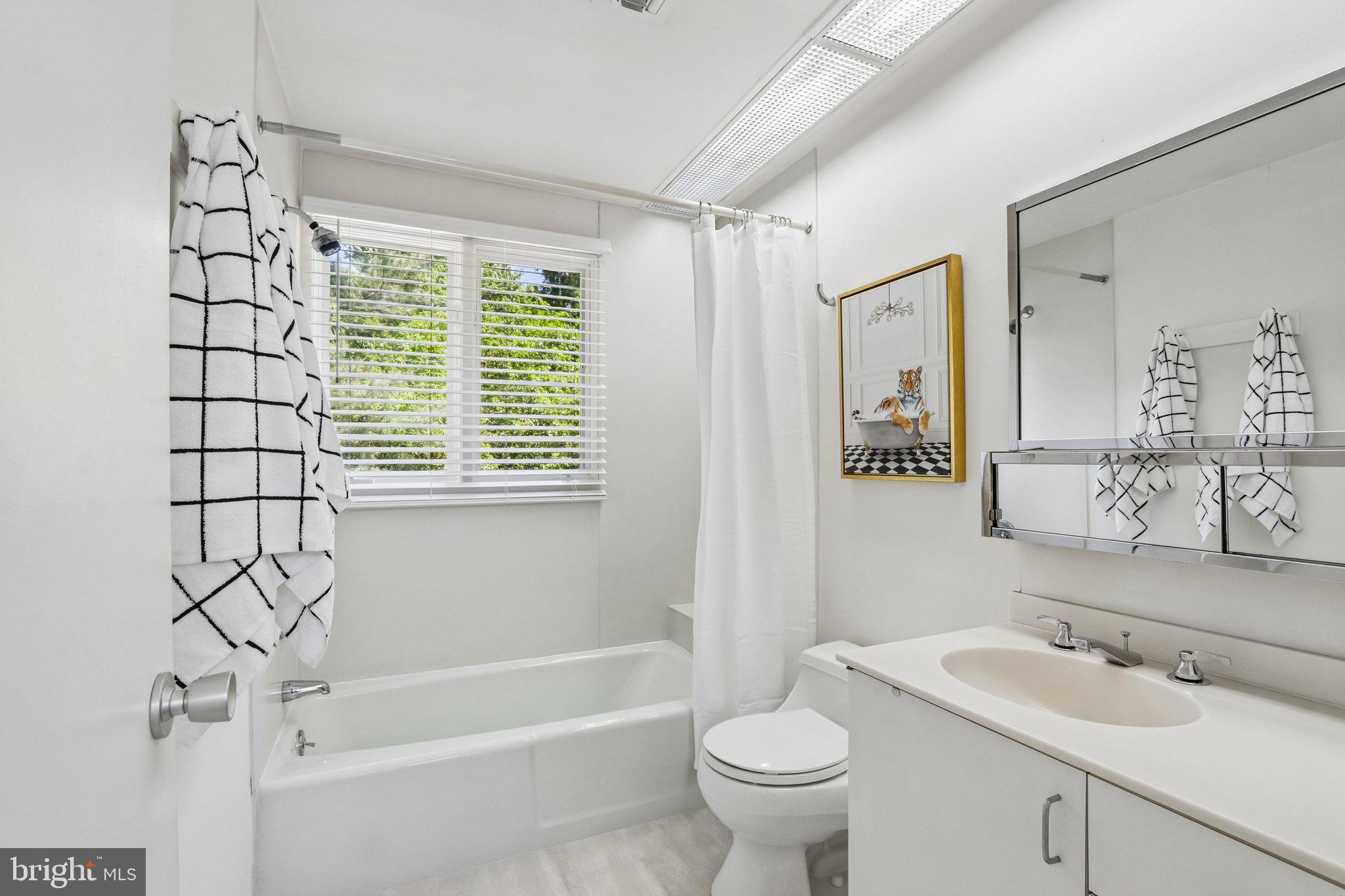 1673 Paper Mill Road Jenkintown, PA 19046 - Photo 45 of 73 a bathroom with a sink toilet and shower