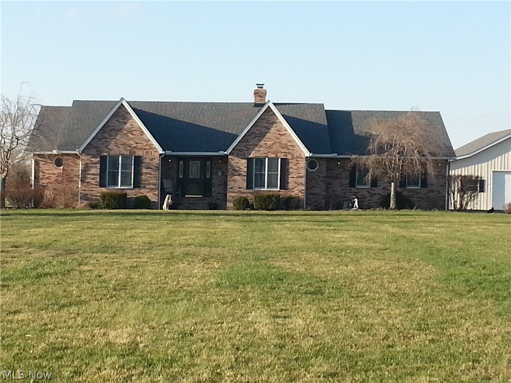 42156 Biggs Road Lagrange, OH 44050 - Photo 1 of 35 Front elevation - garage entrance to the right side