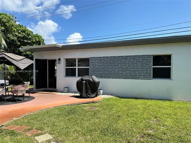 a view of outdoor space and yard