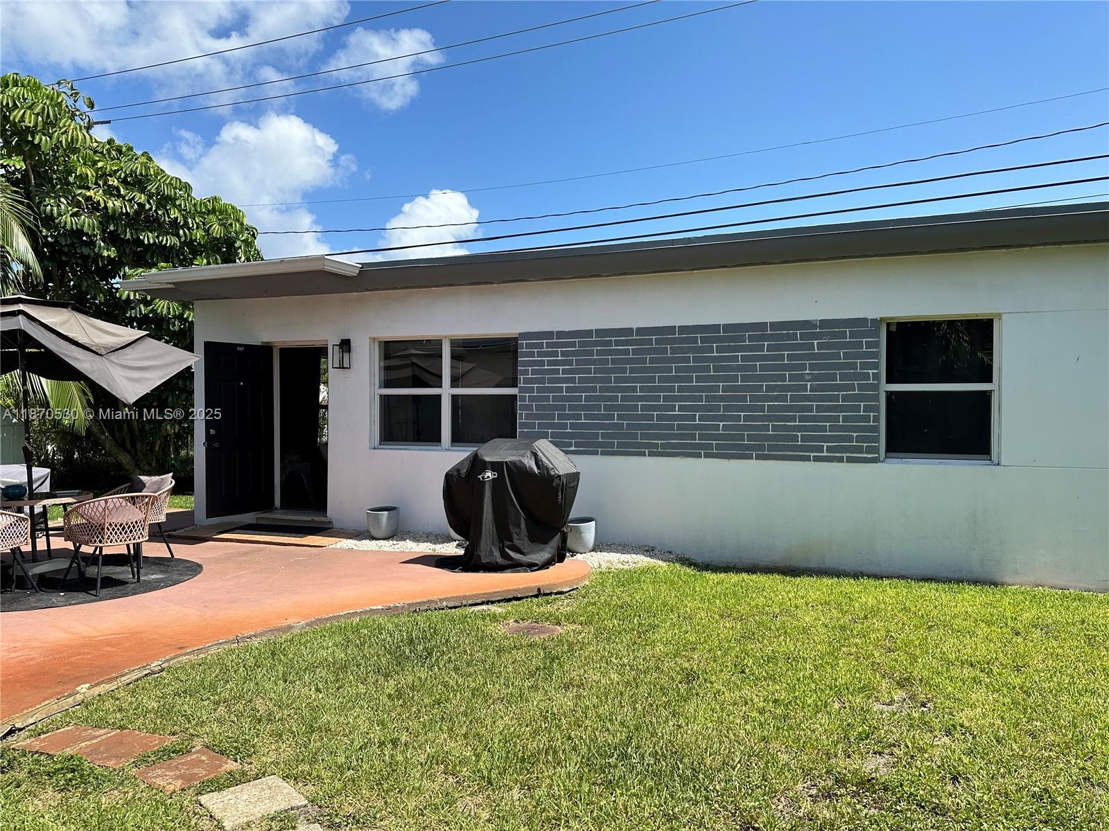 a view of outdoor space and yard