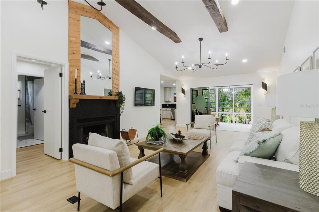 8304 Revels Road Riverview, FL 33569 - Photo 12 of 99 a living room with furniture and a fireplace