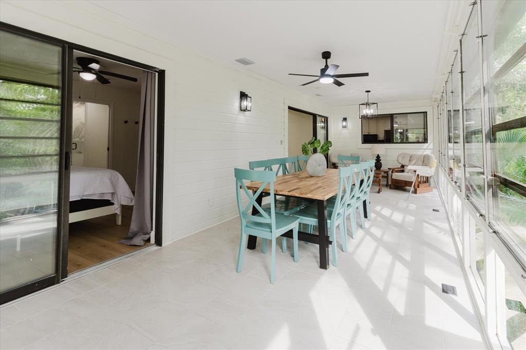 8304 Revels Road Riverview, FL 33569 - Photo 24 of 99 a dining room with furniture and window