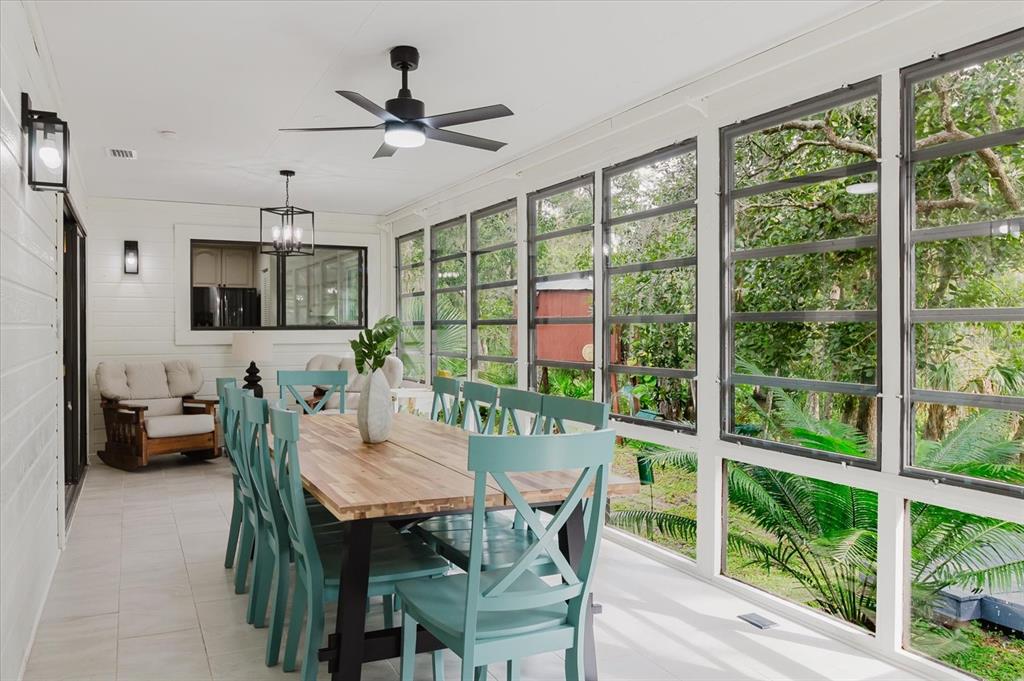 8304 Revels Road Riverview, FL 33569 - Photo 25 of 99 a view of a dining room with furniture window and outside view