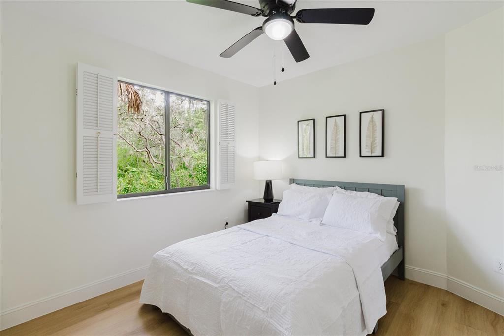 8304 Revels Road Riverview, FL 33569 - Photo 40 of 99 a bedroom with a bed and a window