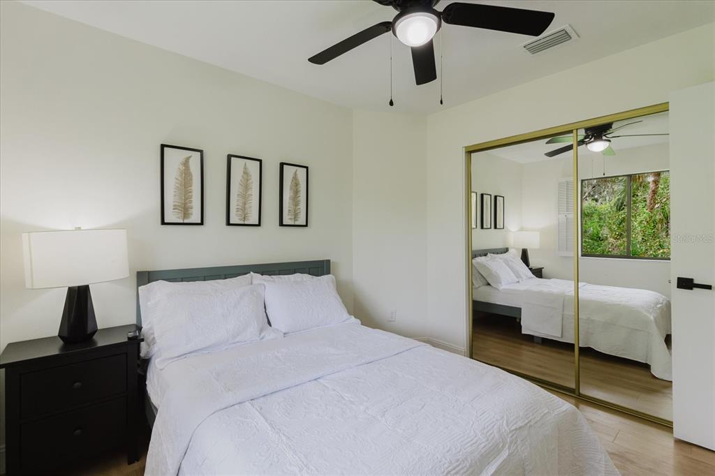 8304 Revels Road Riverview, FL 33569 - Photo 42 of 99 a bedroom with a large bed and a window