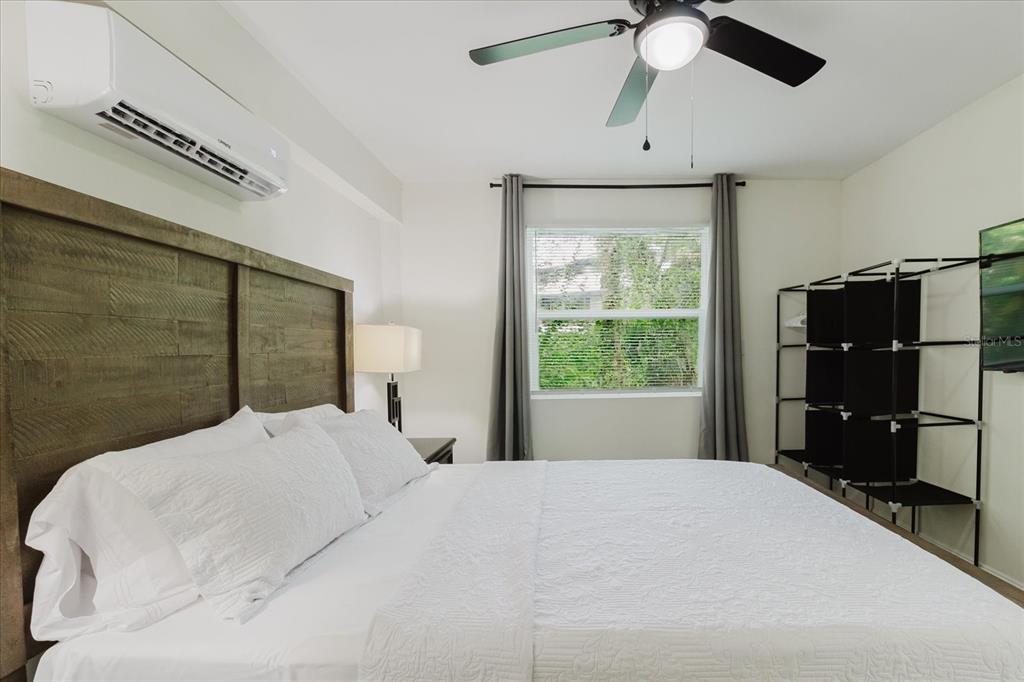 8304 Revels Road Riverview, FL 33569 - Photo 51 of 99 a bedroom with a bed and a window