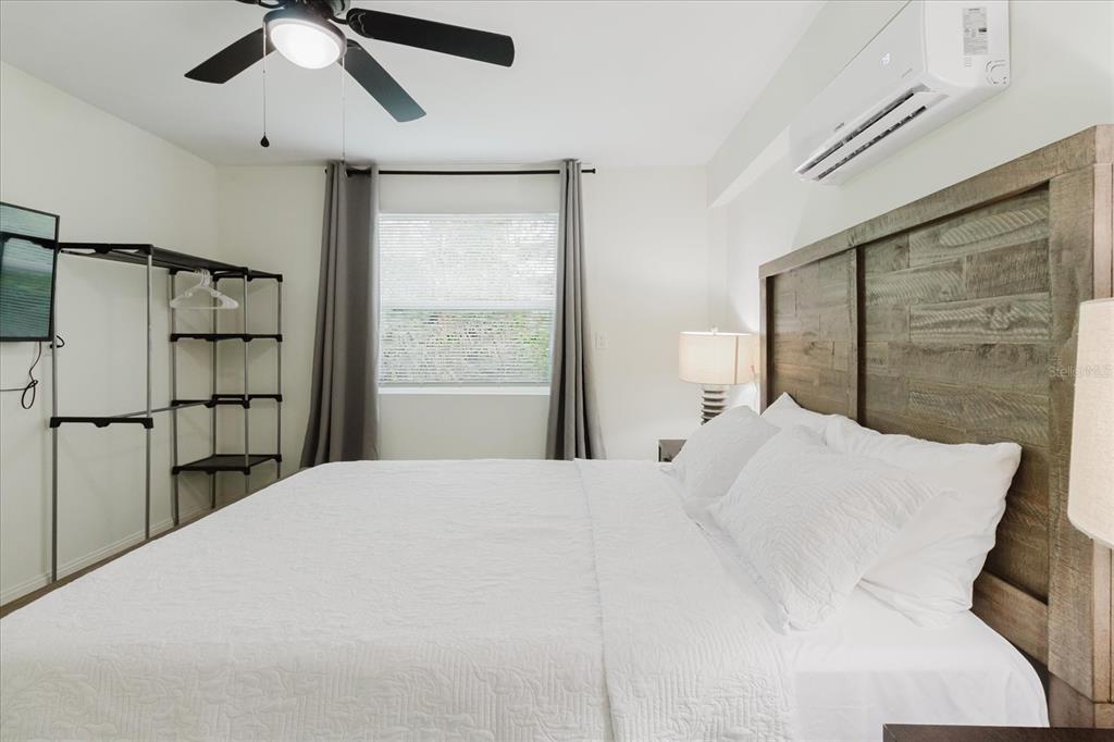 8304 Revels Road Riverview, FL 33569 - Photo 56 of 99 a bedroom with a bed and a ceiling fan