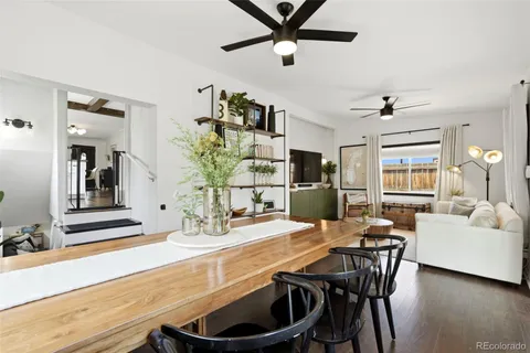 a view of a room with furniture window and wooden floor
