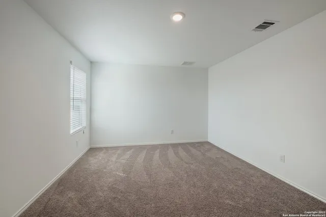 a bathroom with a tub and shower