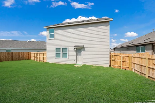 a picture of a book and a bed