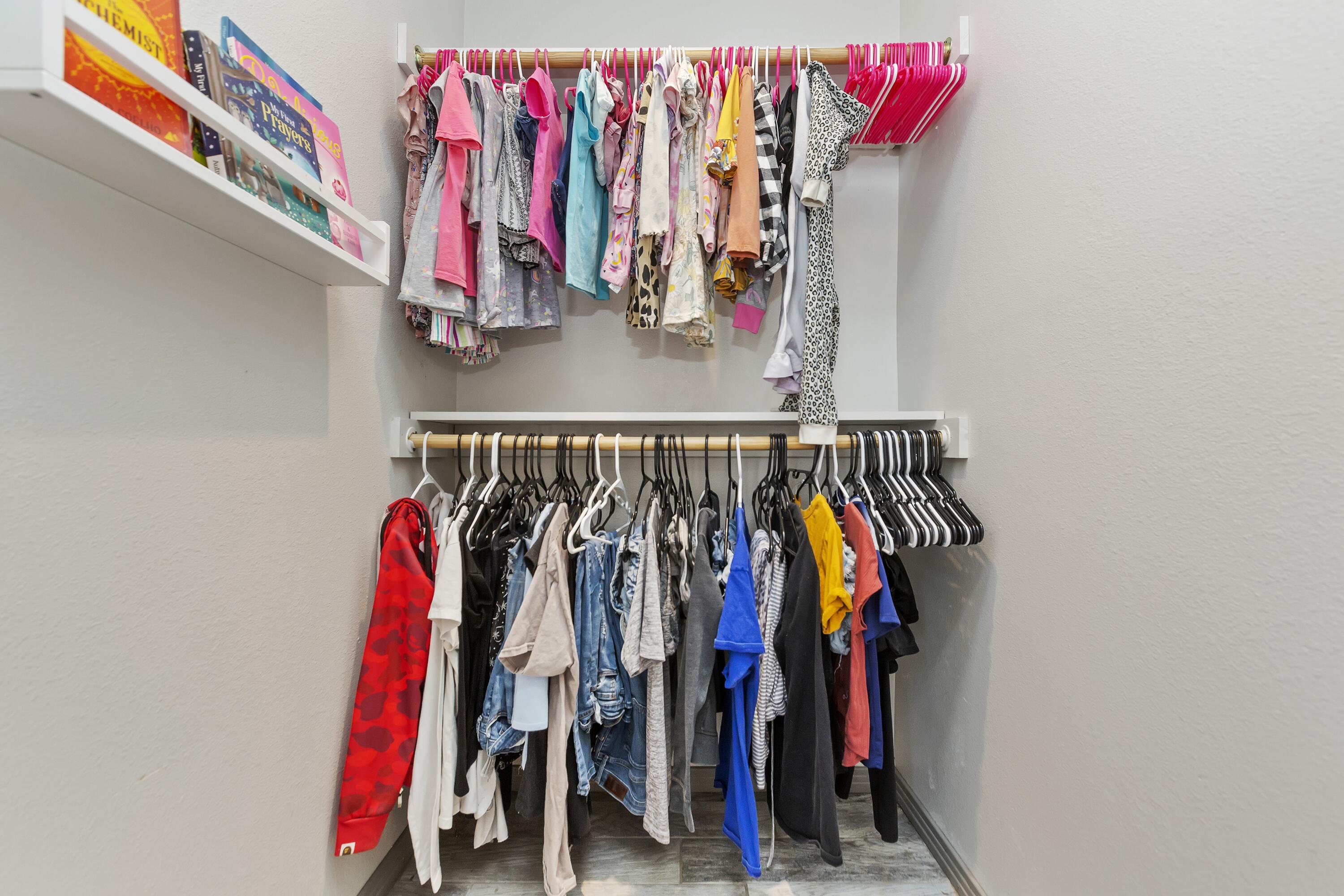 7482 Apache Trail Yucca Valley, CA 92284 - Photo 20 of 38 a view of walk in closet with clothes