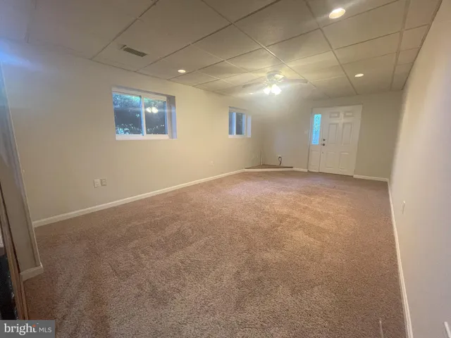 en empty room with windows