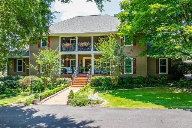 front view of a house with a yard