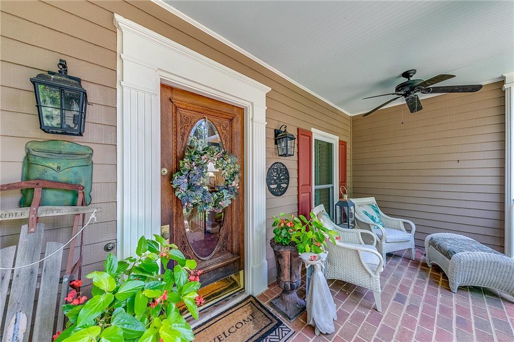 6180 Old Jefferson Road Athens, GA 30607 - Photo 13 of 100 a front view of a house with potted plants