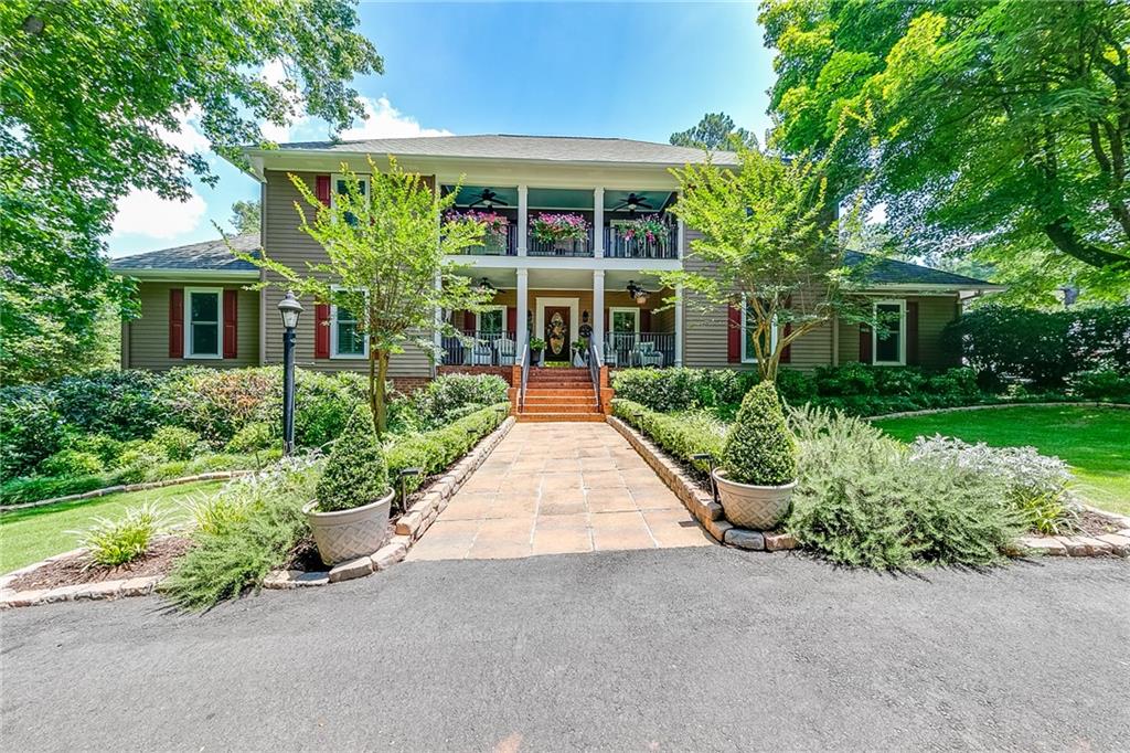 6180 Old Jefferson Road Athens, GA 30607 - Photo 2 of 100 front view of a house with a yard