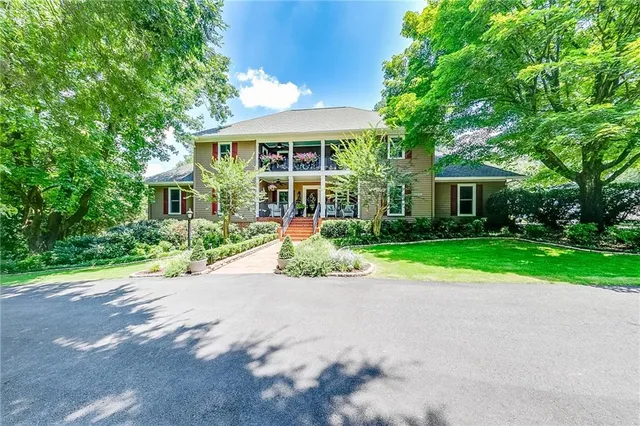 a view of a outdoor space with a lake view