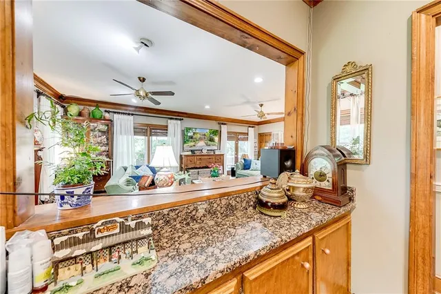a view of a kitchen with furniture and a kitchen view