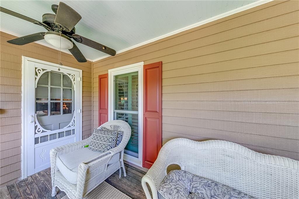 6180 Old Jefferson Road Athens, GA 30607 - Photo 42 of 100 a bedroom with a bed and a view of balcony