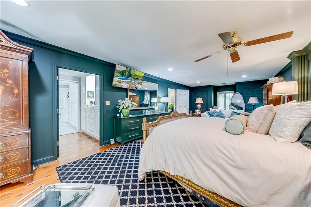 6180 Old Jefferson Road Athens, GA 30607 - Photo 43 of 100 a bedroom with a bed and wooden floor