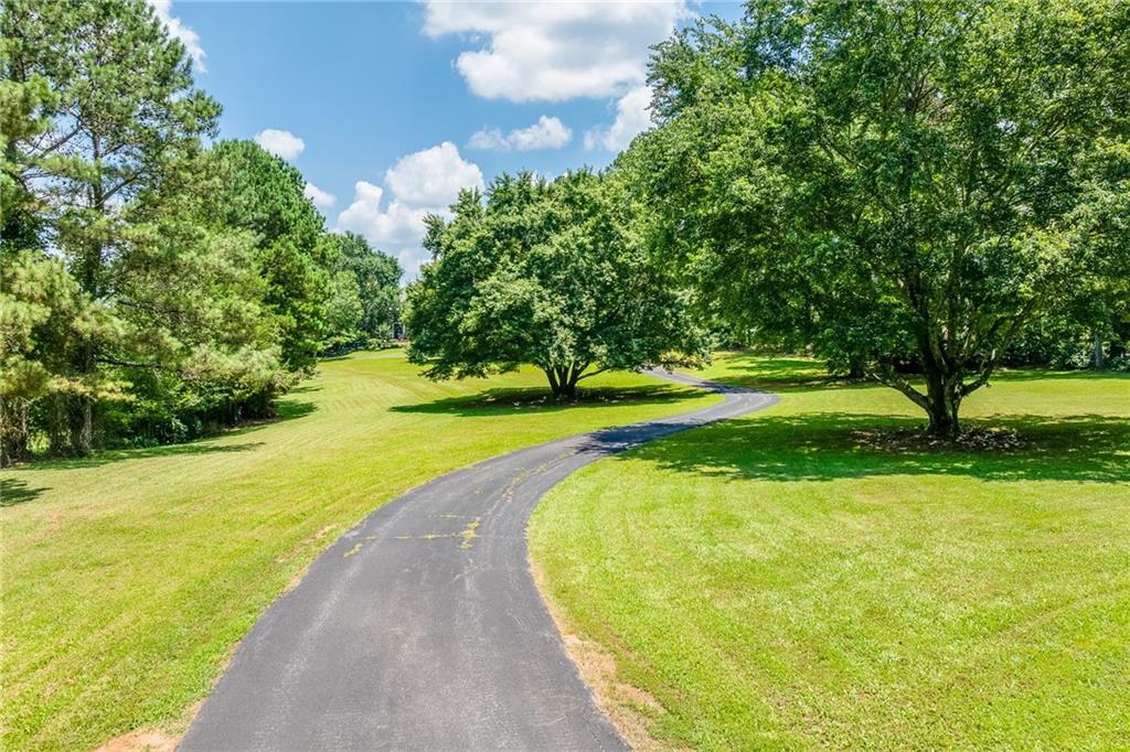 6180 Old Jefferson Road Athens, GA 30607 - Photo 5 of 100 a view of a swimming pool with a yard