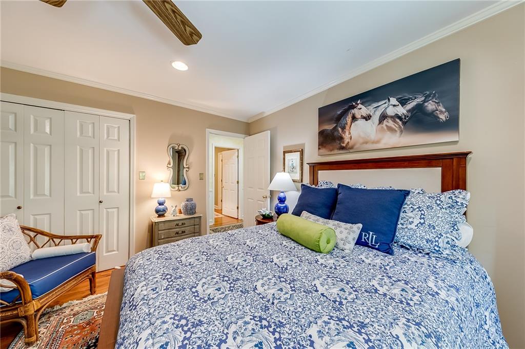 6180 Old Jefferson Road Athens, GA 30607 - Photo 53 of 100 a bed room with a bed and a painting on the wall