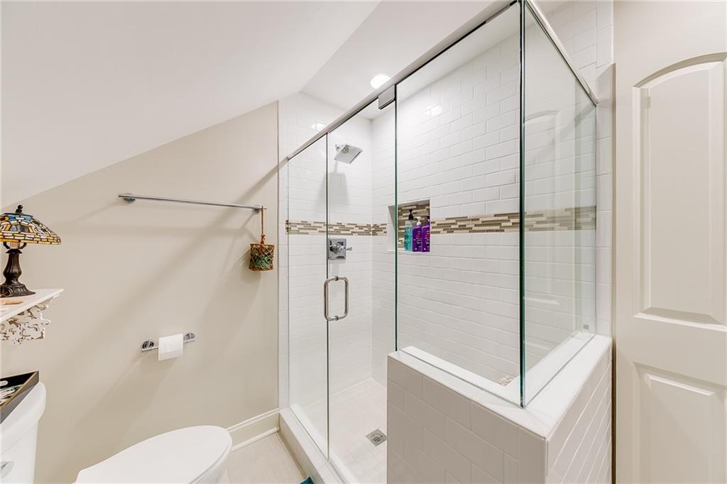 6180 Old Jefferson Road Athens, GA 30607 - Photo 60 of 100 a bathroom with a shower and toilet