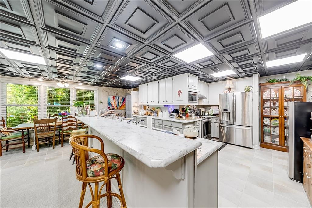 6180 Old Jefferson Road Athens, GA 30607 - Photo 64 of 100 a view of a kitchen with furniture and a kitchen view