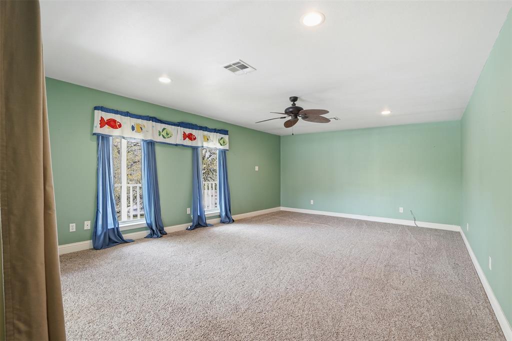 5014 Mohawk Court DeCordova, TX 76049 - Photo 21 of 36 an empty room with windows and closet