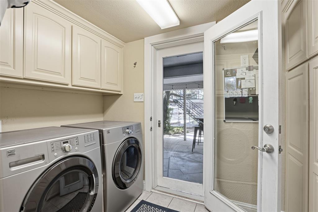 5014 Mohawk Court DeCordova, TX 76049 - Photo 23 of 36 a view of livingroom with washer and dryer
