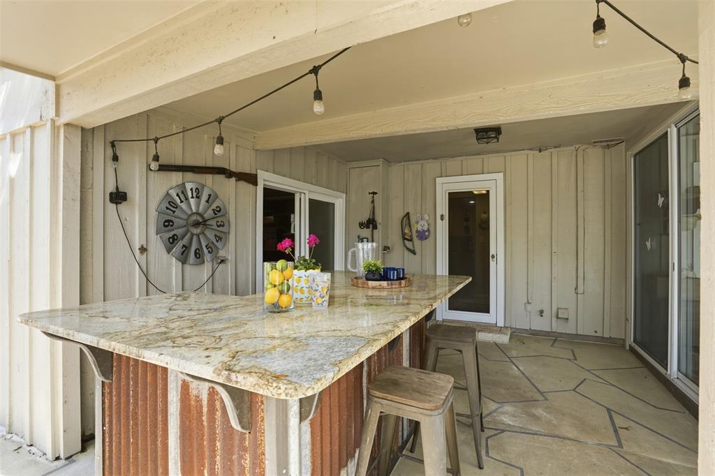 5014 Mohawk Court DeCordova, TX 76049 - Photo 25 of 36 a kitchen with a table and chairs in it