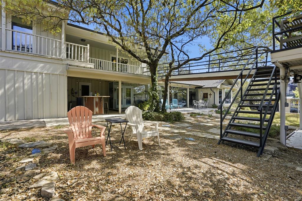 5014 Mohawk Court DeCordova, TX 76049 - Photo 26 of 36 a view of a house with backyard and sitting area