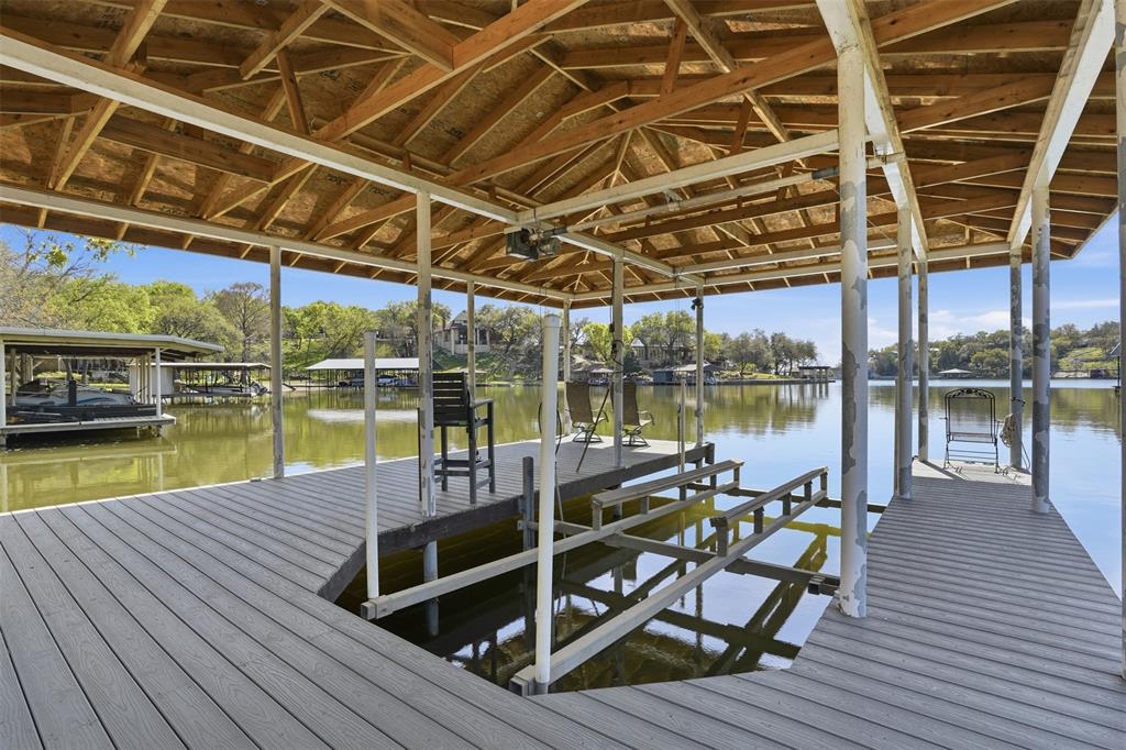5014 Mohawk Court DeCordova, TX 76049 - Photo 30 of 36 a view of a swimming pool with a patio