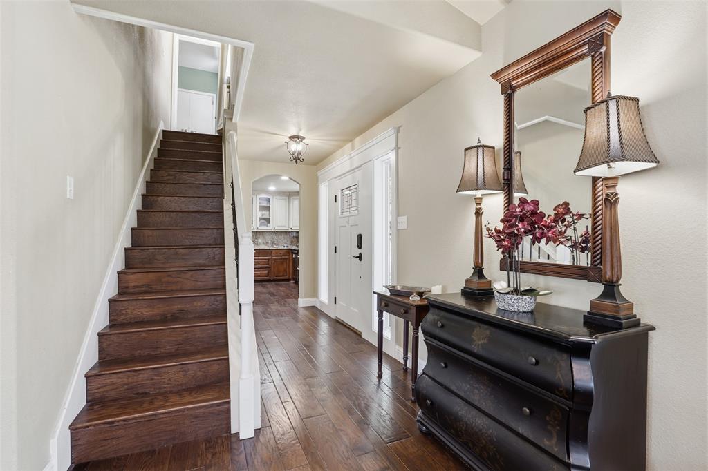 5014 Mohawk Court DeCordova, TX 76049 - Photo 9 of 36 a view of entryway and hall with wooden floor