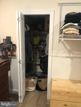 a room with furniture and flat screen tv