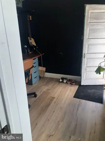 a view of a sink and storage in a room