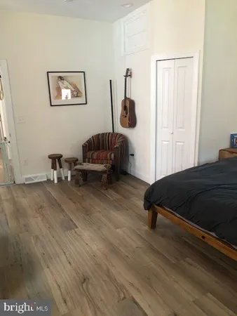 a view of a living room with furniture