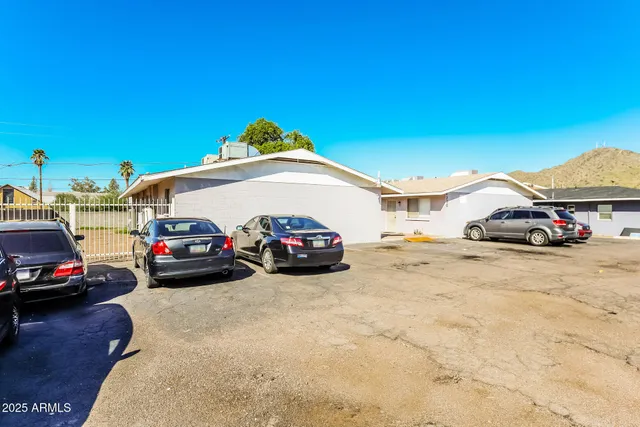 a view of cars parked in a parking lot