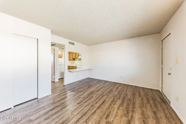 a view of kitchen with wooden floor
