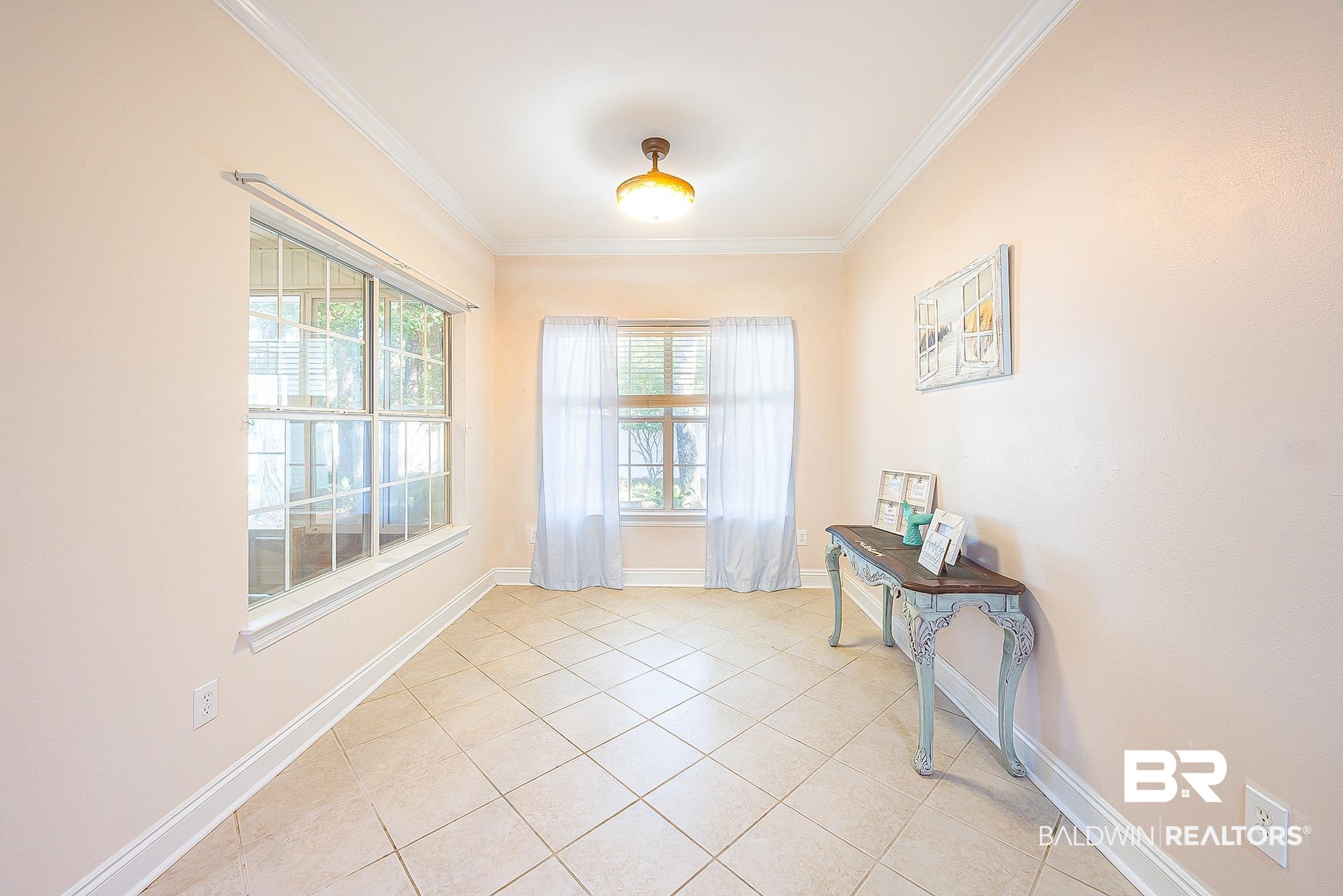 133 Mark Twain Loop Foley, AL 36535 - Photo 25 of 61 Doorway featuring crown molding and light tile patterned floors