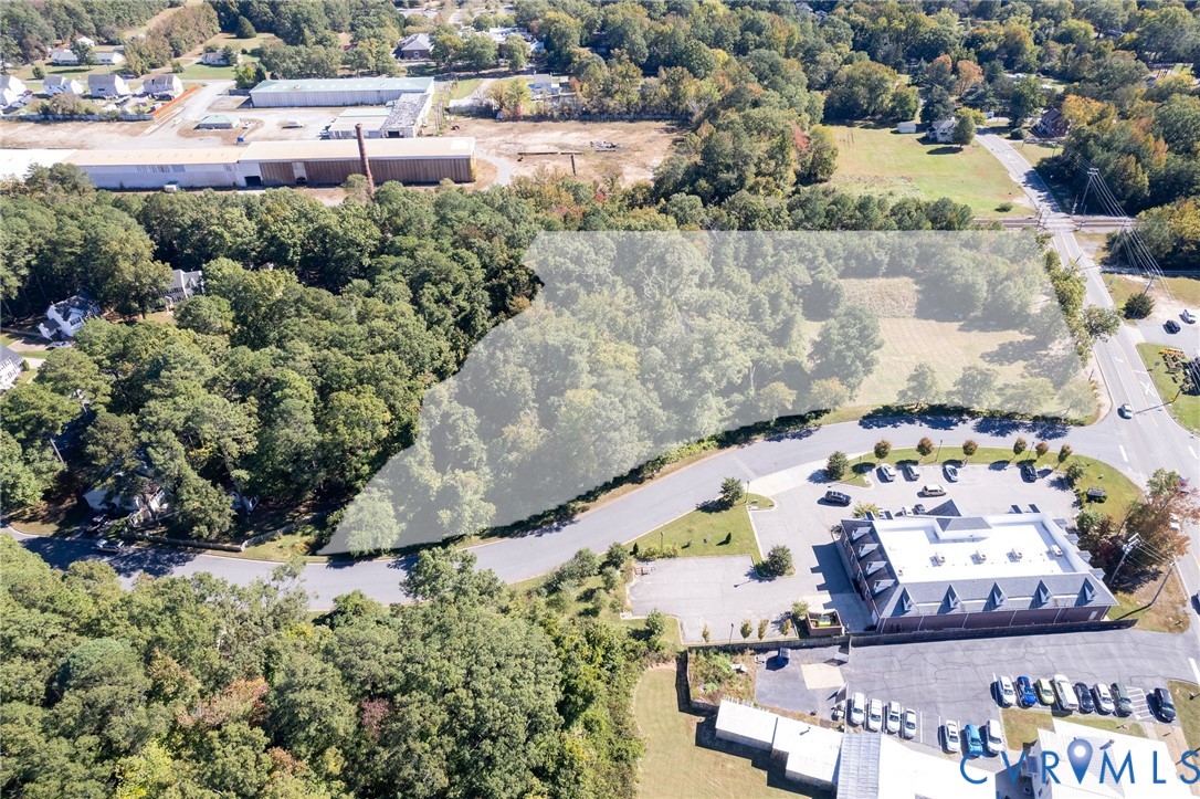 3002 Mountain Road Glen Allen, VA 23060 - Photo 8 of 13 an aerial view of a house with a yard and lake view